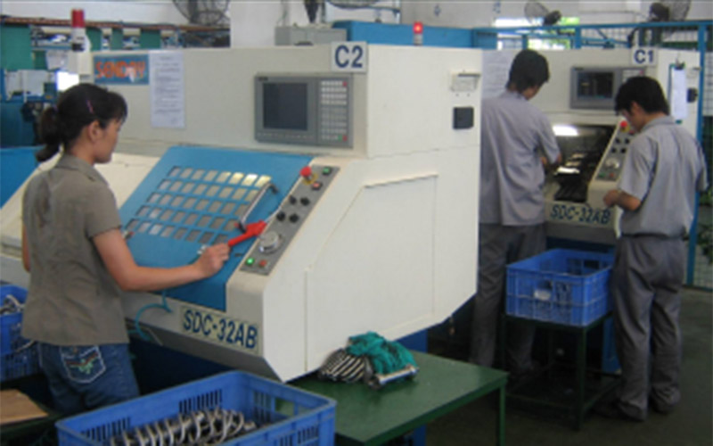 china cnc employees working equipment